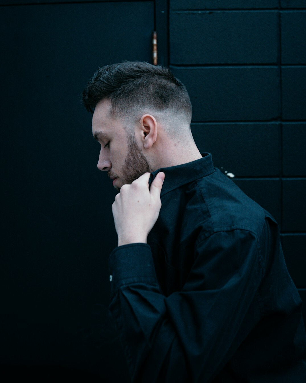 Portrait of a bearded man in a dark shirt