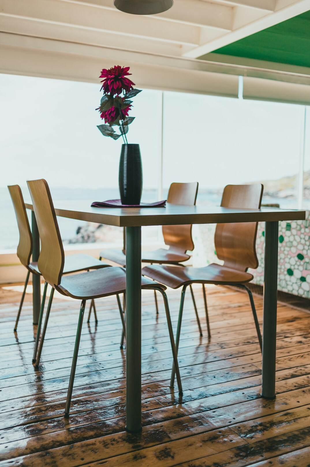 Group of colleagues collaborating around a table in a meeting room